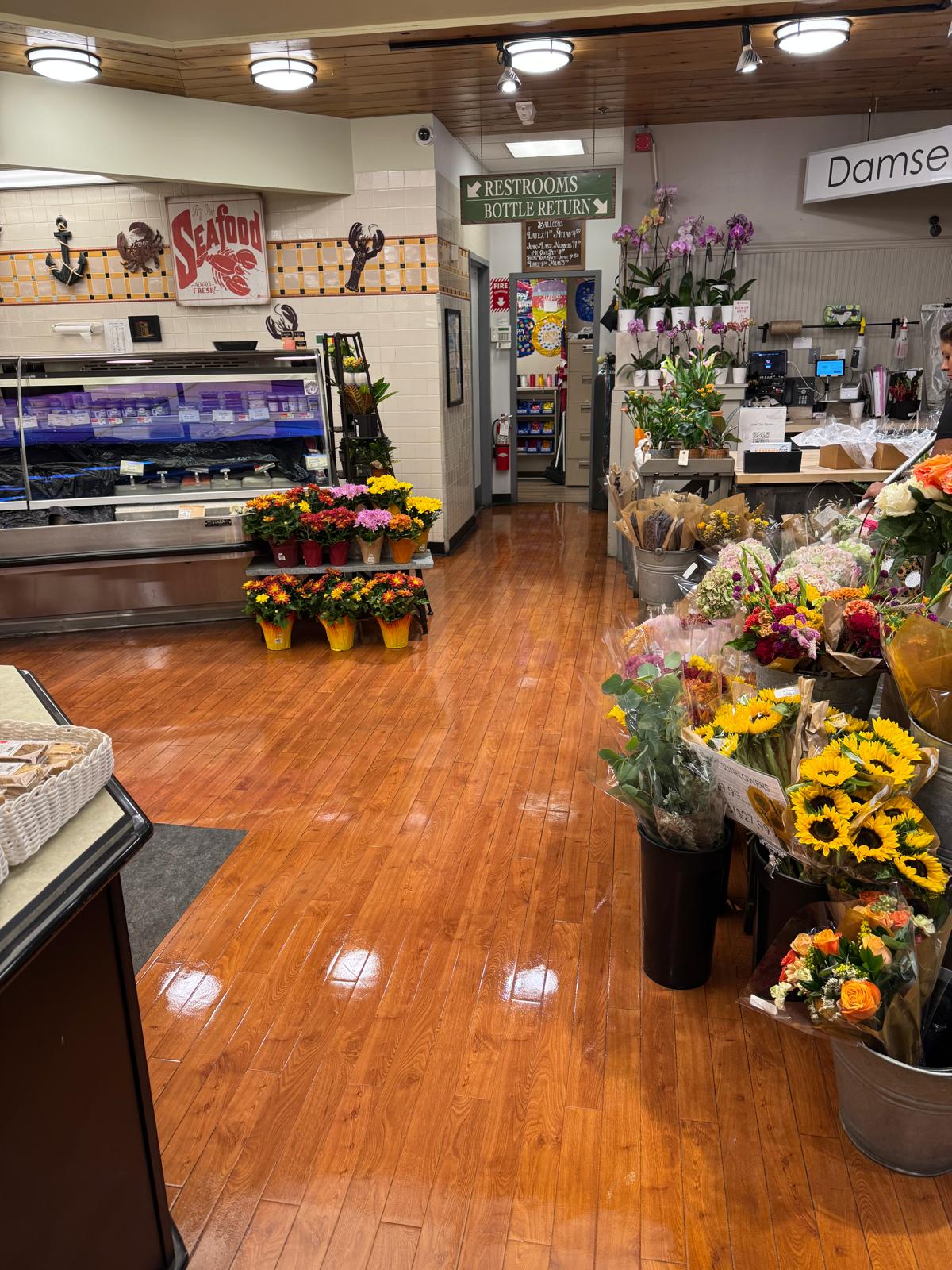 Floral section wood floor after stripping and waxing