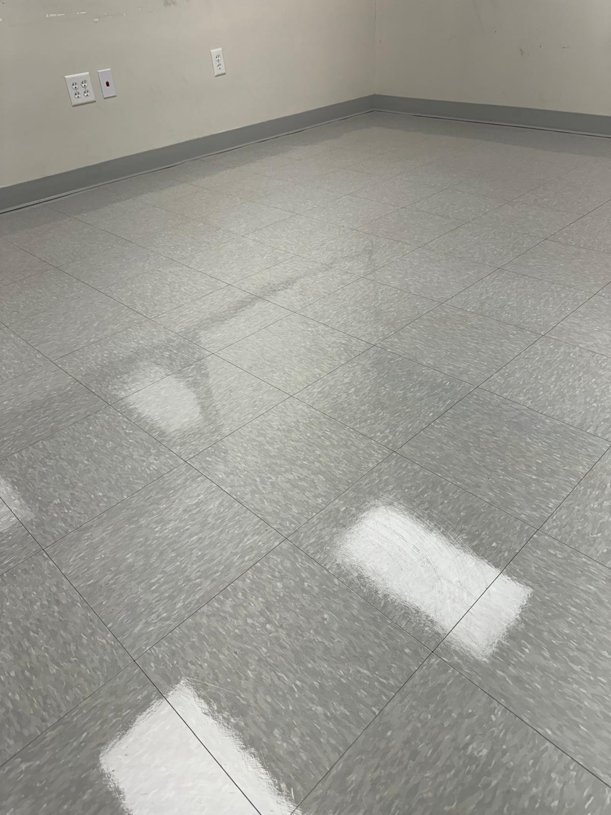 Office room gray VCT tile after restoration