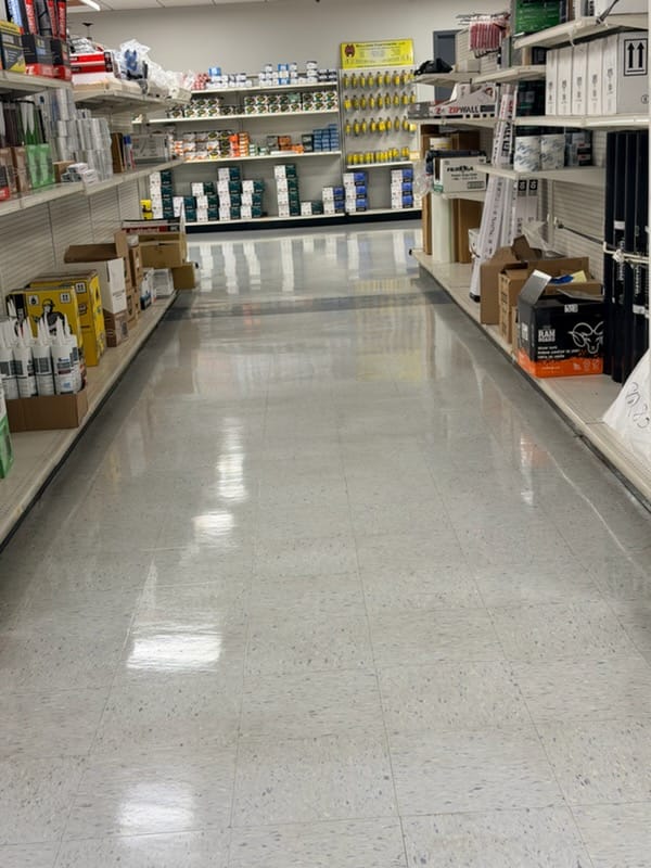 Retail VCT tile floor after professional stripping and waxing